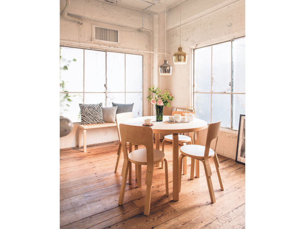 Artek 66 Chair | Lifestyle Image with Bench and Round Aalto Table