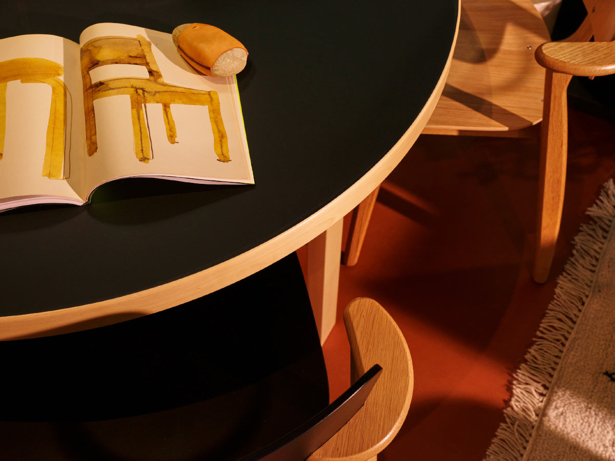 Artek 91 Table designed by Alvar Aalto - Close up of Black Linoleum