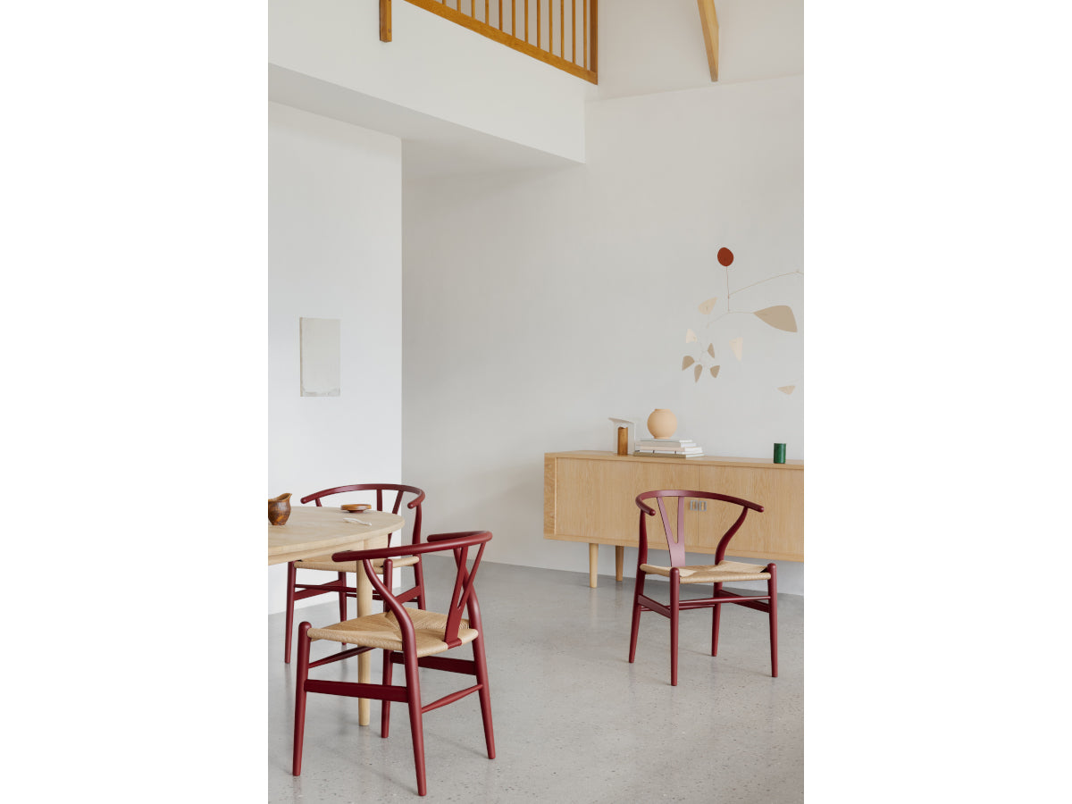 Carl Hansen CH24 Wishbone Chair - Soft Ilse Crawford | Natural Papercord - Lifestyle Terracotta Red and sideboard