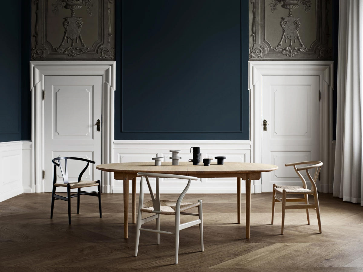 Carl Hansen CH338 Dining Table | Lifestyle with CH24 Wishbone Chairs