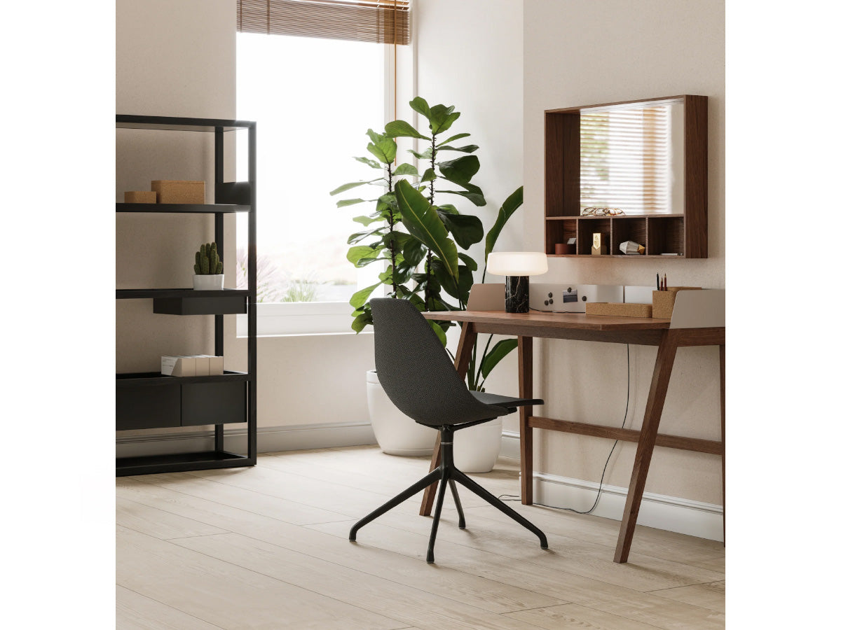 Modern office setup with a desk, chair, and shelves in a bright room.