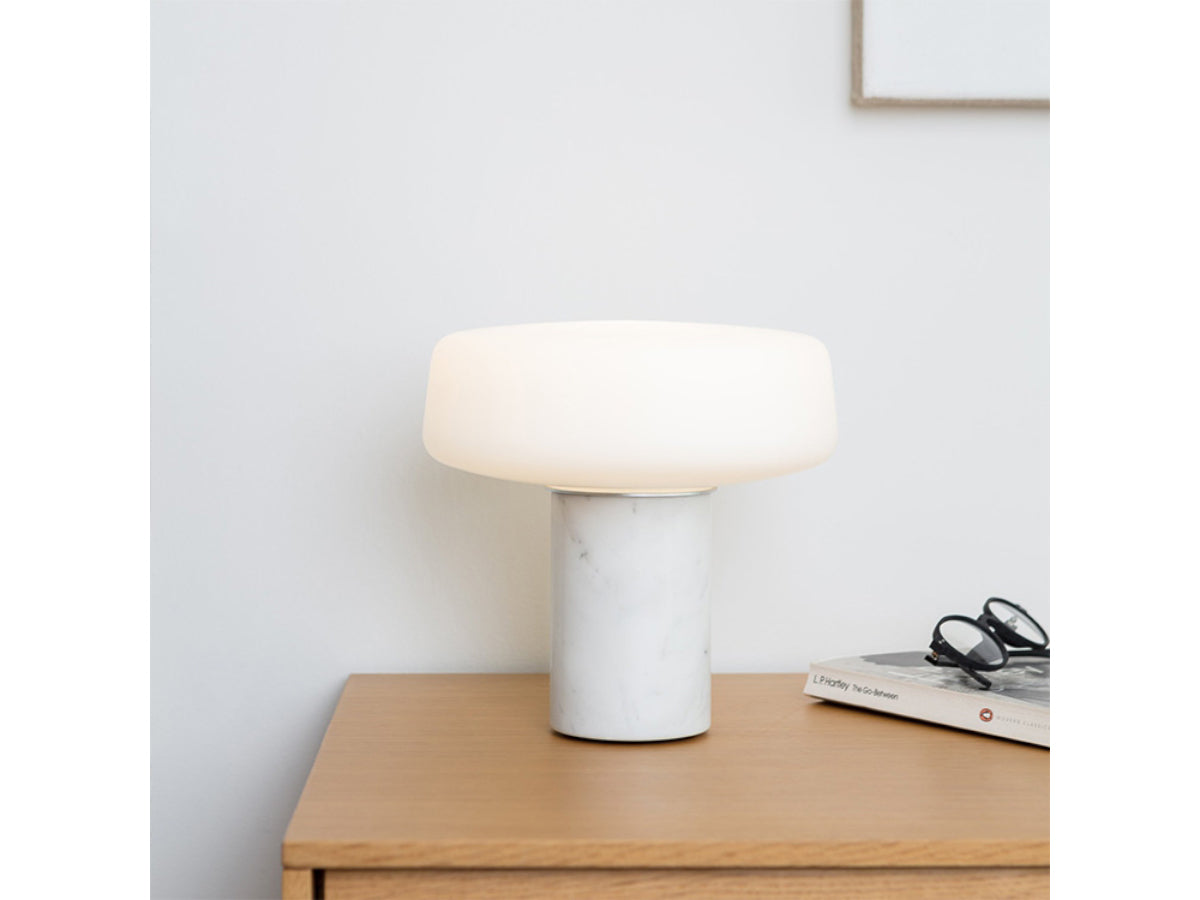 Terence Woodgate Solid Table Light Small - Carrara Marble on oak case sideboard