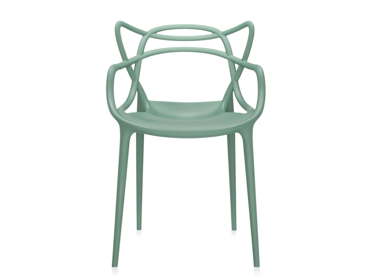 Kartell Masters Sage Green chair with a modern design on a white background