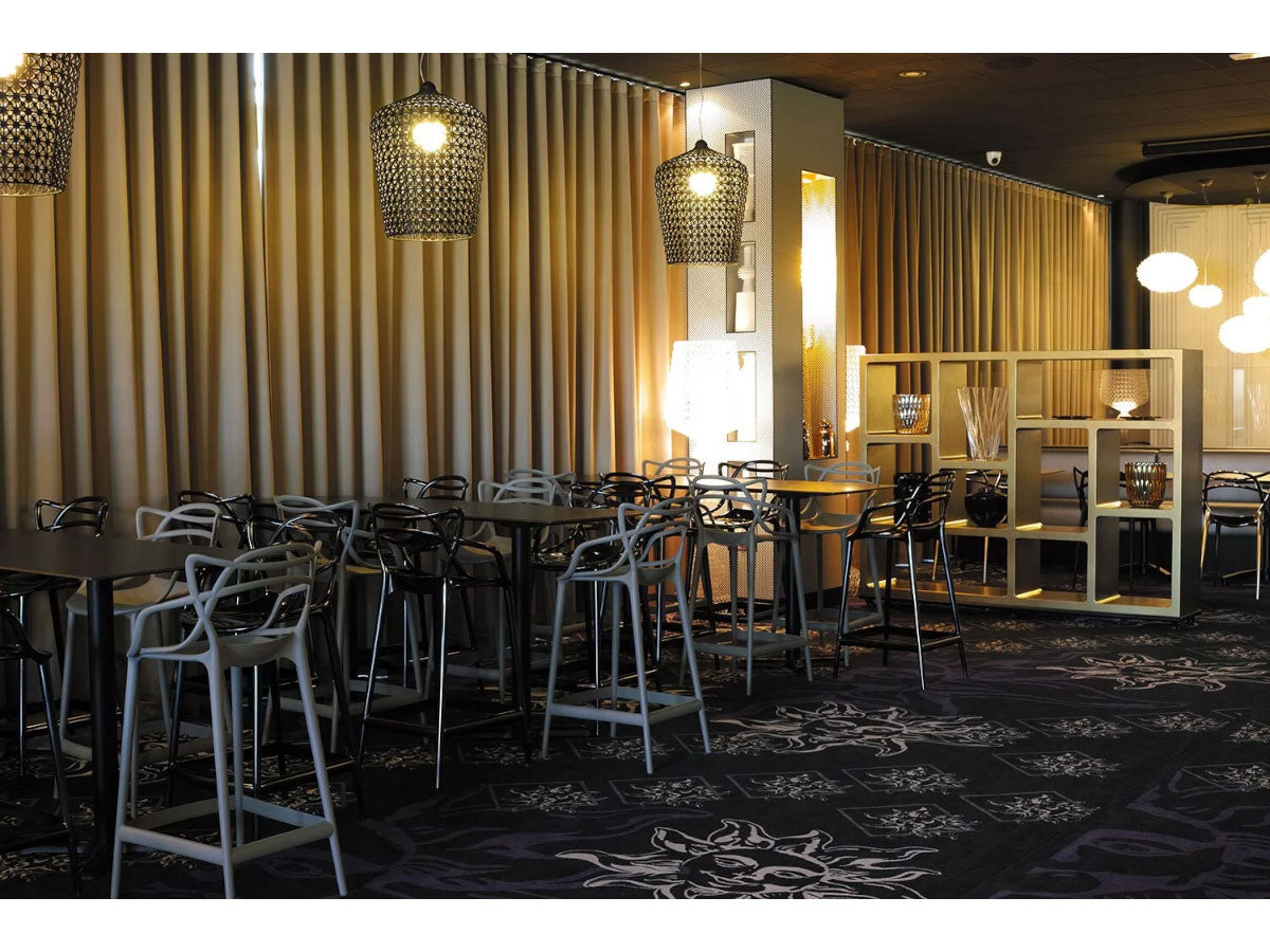 Kartell Masters Stools in Grey in restaurant setting