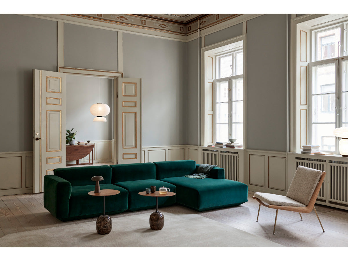 &Tradition Boomerang Lounge Chair Oak HM1 | Karakorum 003 Fabric | Brass Legs - Lifestyle with Develius Sofa